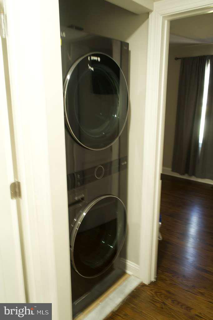133 Heulings Avenue Riverside, NJ 08075 - Photo 18 of 31 a close view of a utility room with dryer and washer