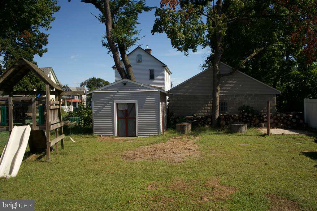 133 Heulings Avenue Riverside, NJ 08075 - Photo 29 of 31 a view of a house with a yard and tree s