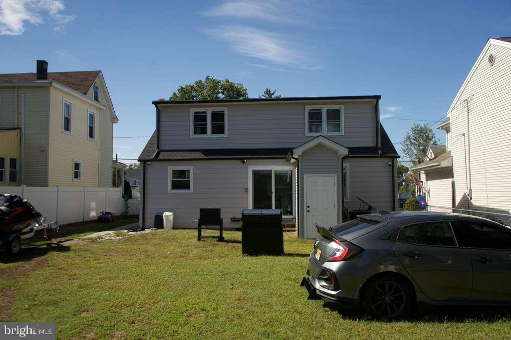 133 Heulings Avenue Riverside, NJ 08075 - Photo 30 of 31 a front view of a house with a yard