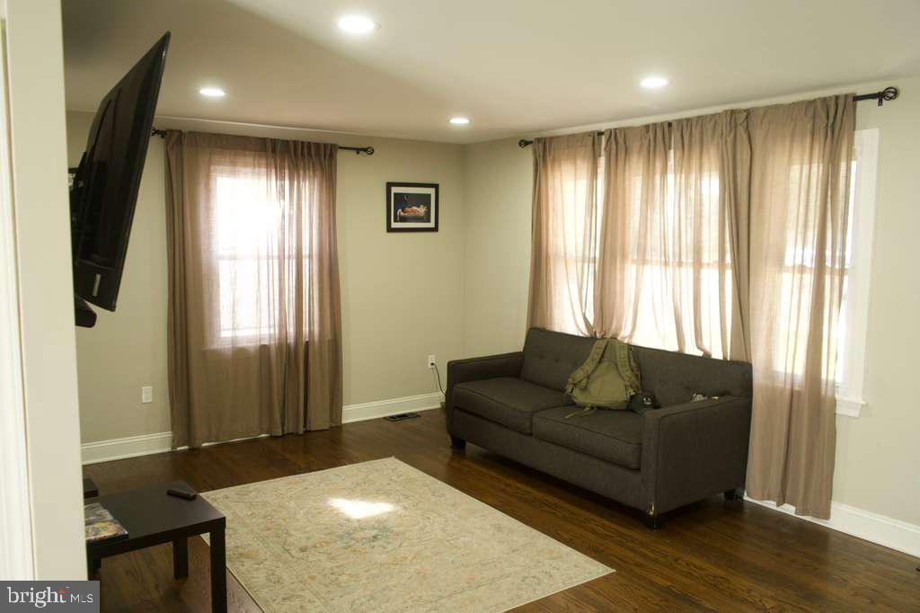 133 Heulings Avenue Riverside, NJ 08075 - Photo 5 of 31 a living room with furniture and a window