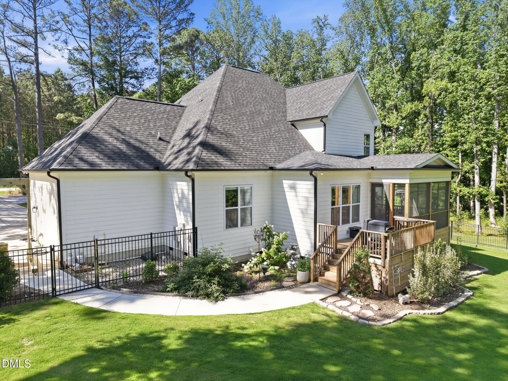 3511 Bruce Garner Road Wake Forest, NC 27587 - Photo 53 of 56 a view of a house with a yard and sitting area