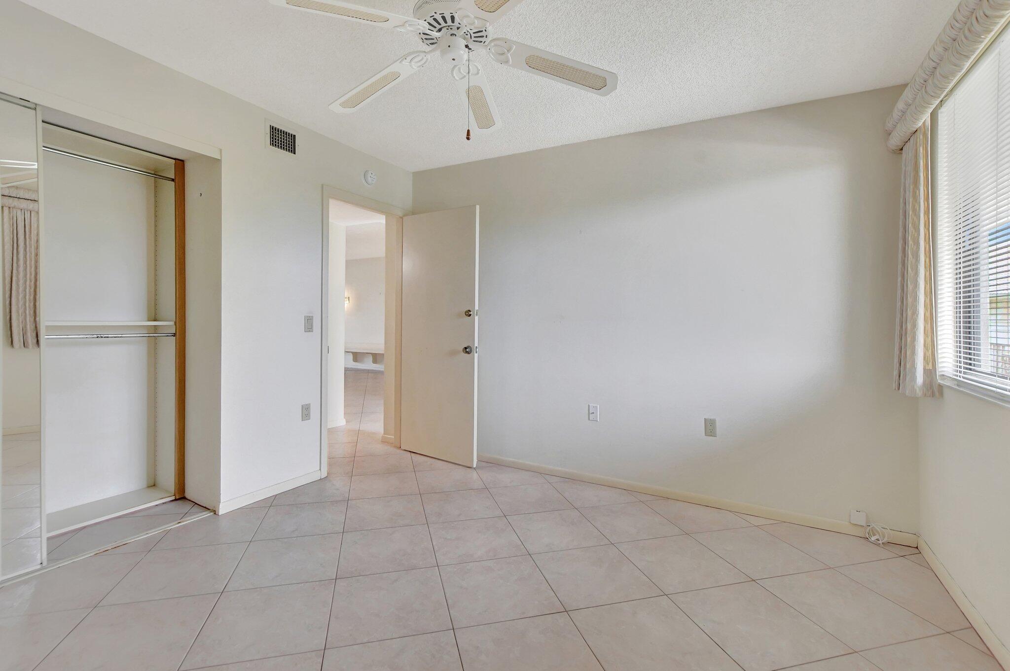 6145 Balboa Circle, Unit 405 Boca Raton, FL 33433 - Photo 22 of 25 Guest Bedroom