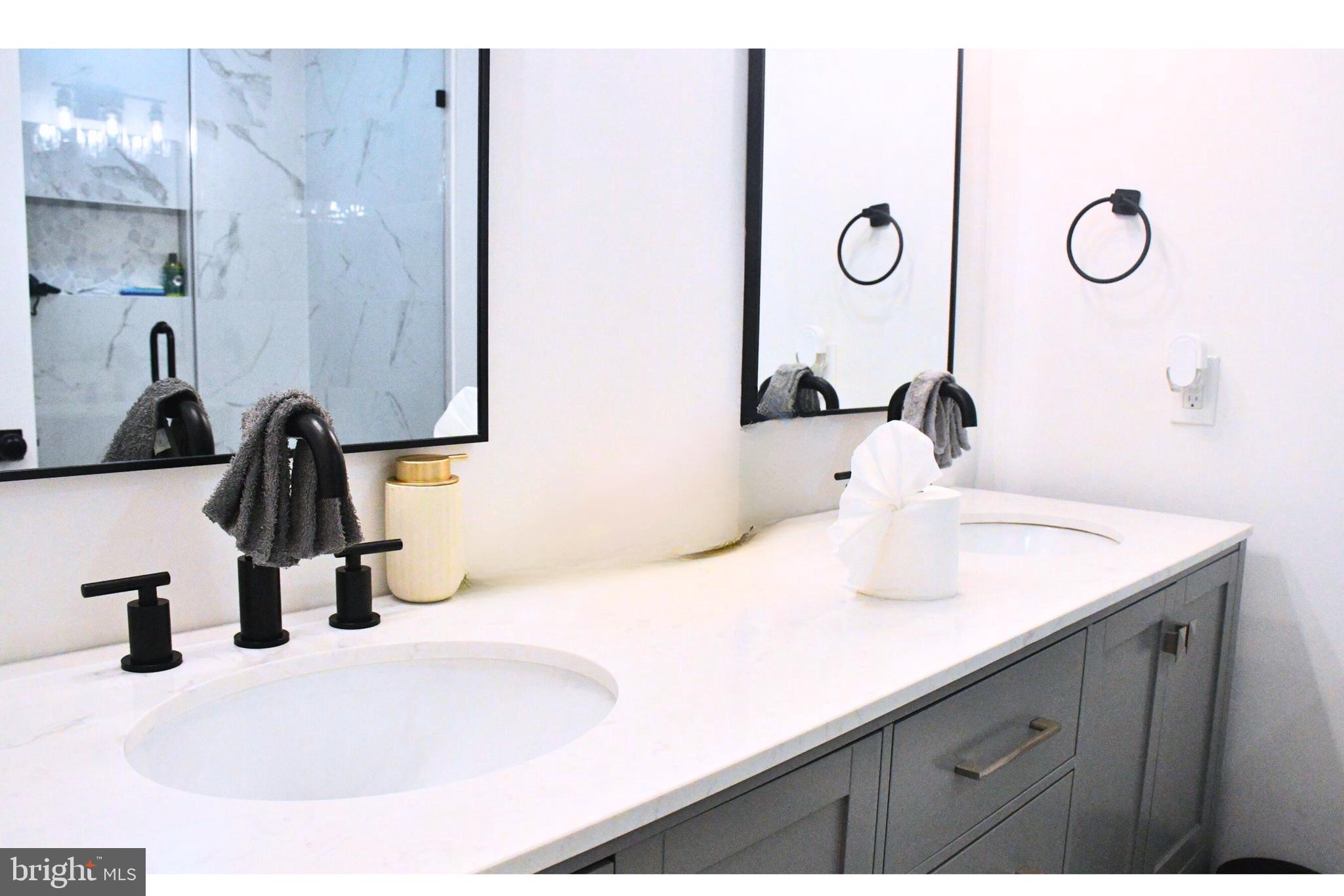 17930 Masemore Road Parkton, MD 21120 - Photo 29 of 46 a bathroom with a sink and a mirror
