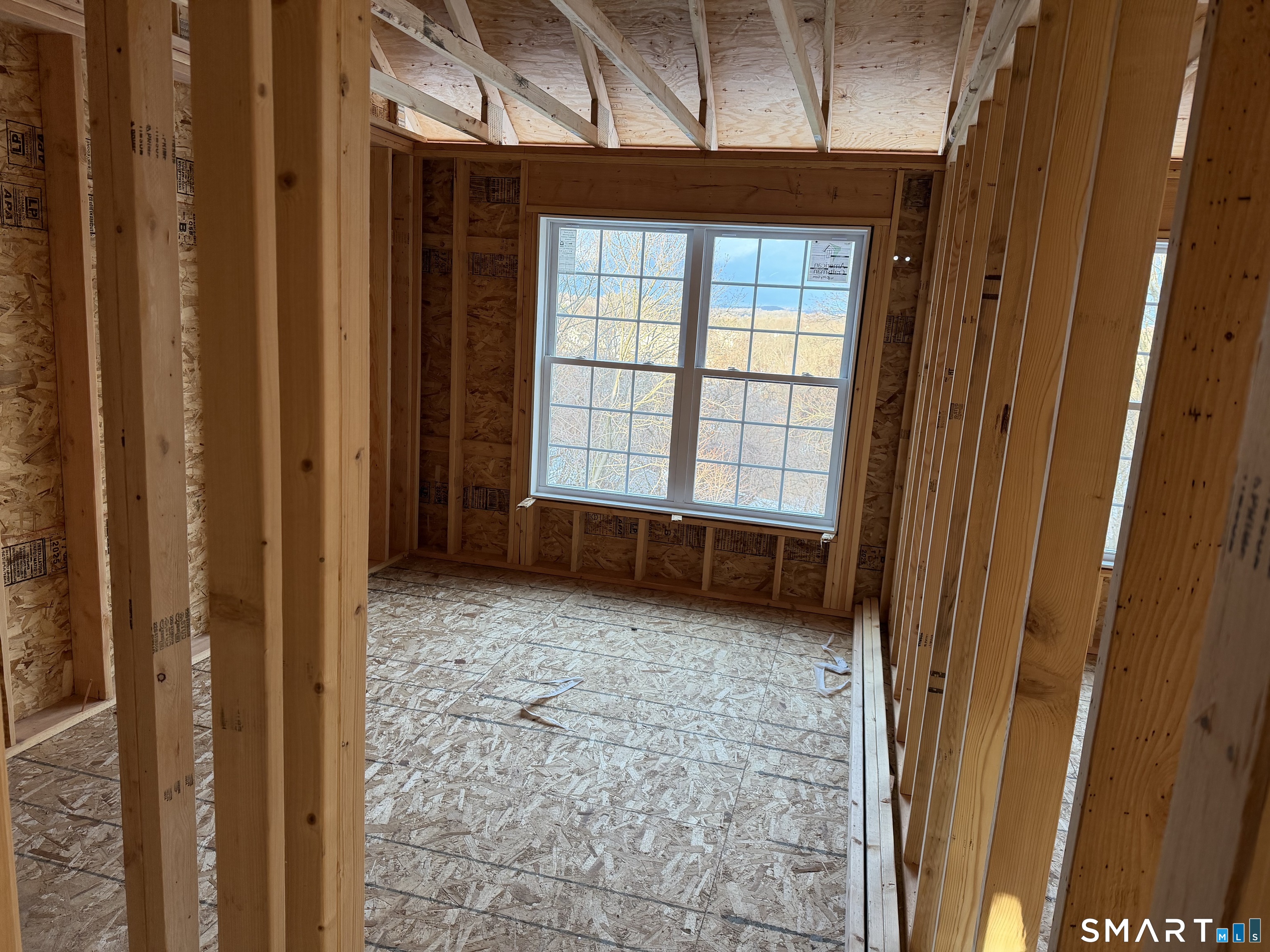 17 Staples Street Danbury, CT 06810 - Photo 2 of 6 a view of an empty room with a window