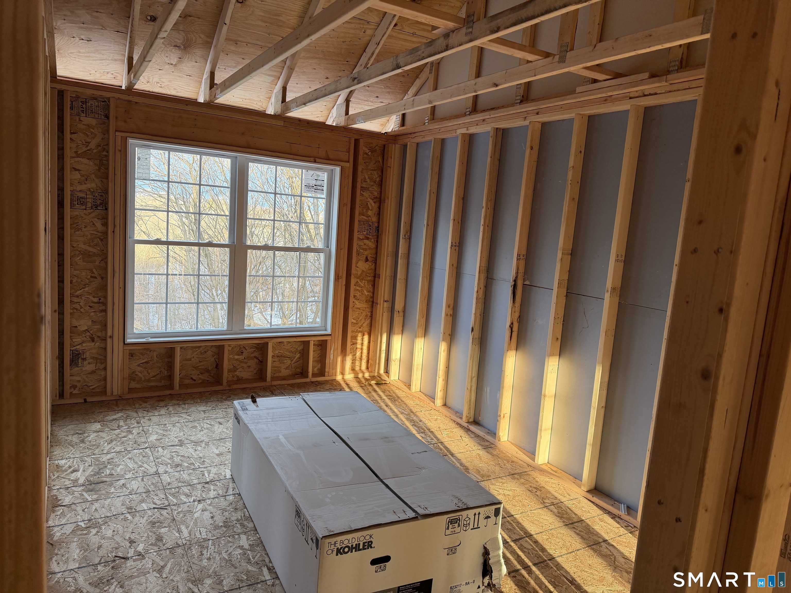 17 Staples Street Danbury, CT 06810 - Photo 5 of 6 a view of an empty room with a window