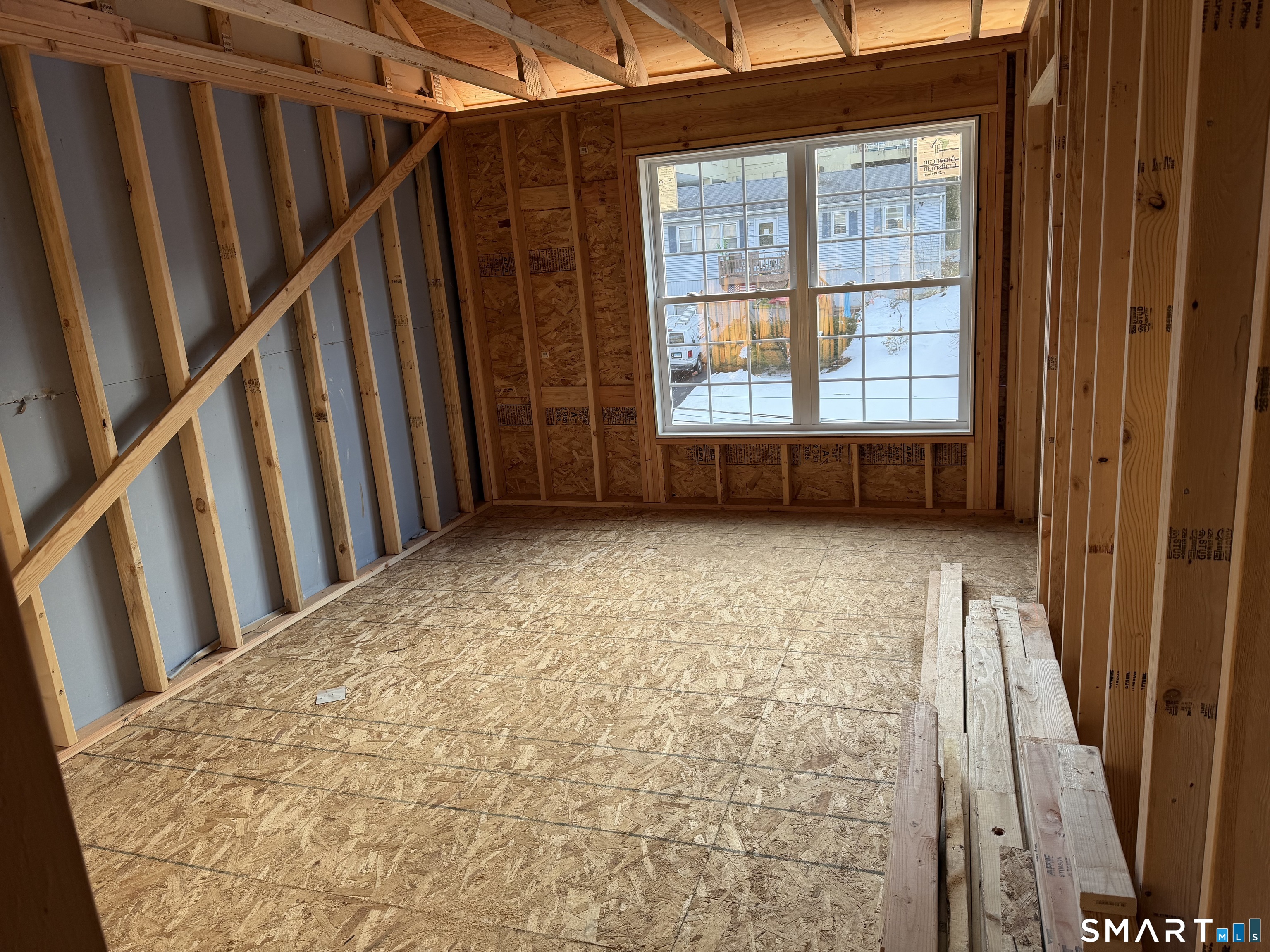 17 Staples Street Danbury, CT 06810 - Photo 6 of 6 a view of an empty room with a window