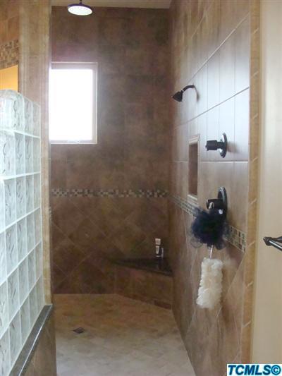 164 South Cornucopia Road Exeter, CA 93221 - Photo 9 of 9 a bathroom with a shower