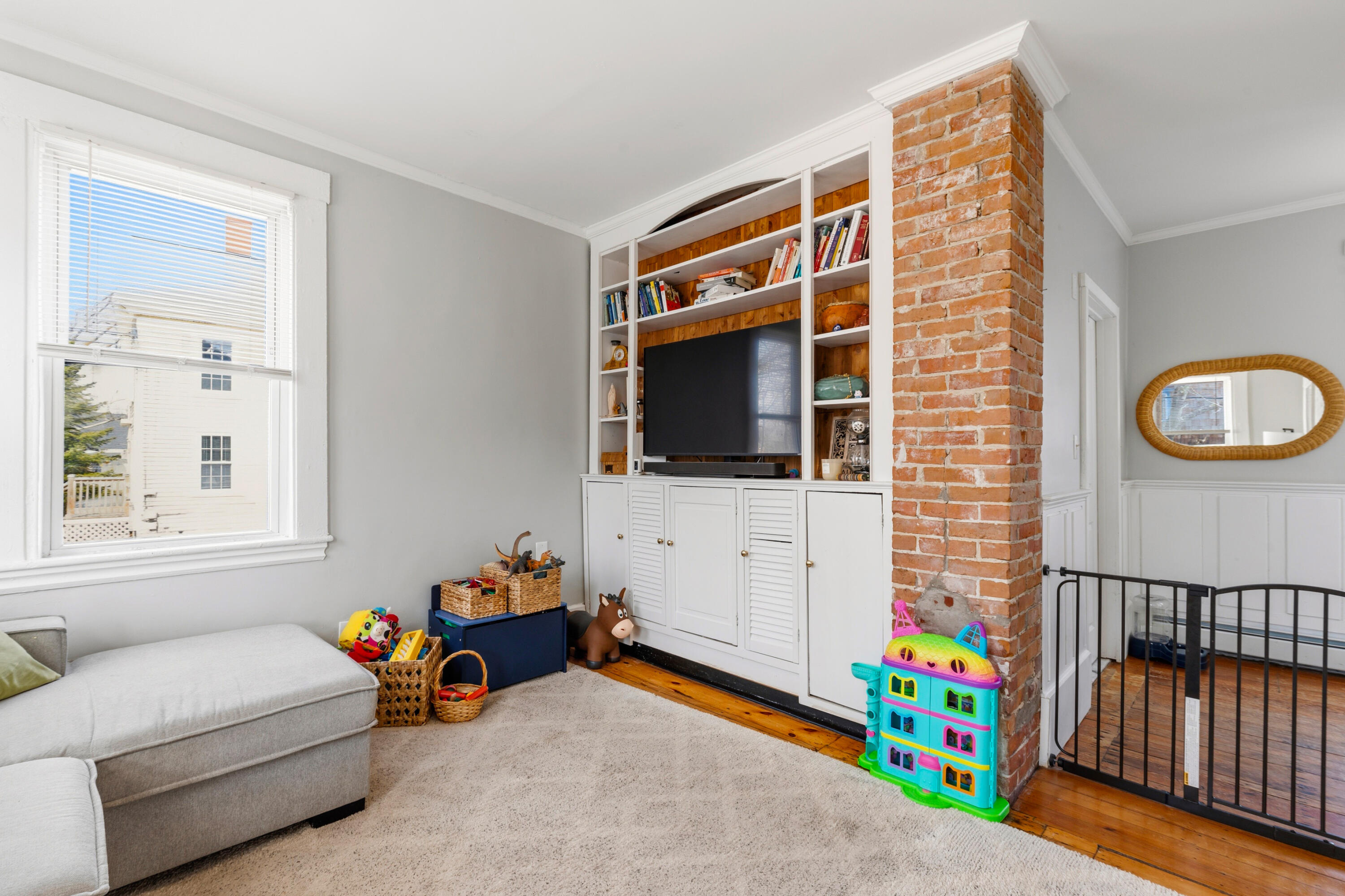 7 Union Street Saco, ME 04072 - Photo 12 of 36 Living with original brick charm