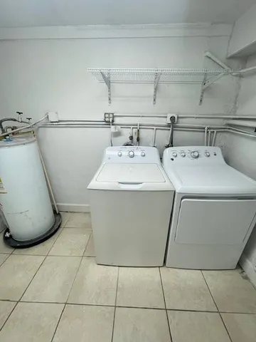 a utility room with washer and dryer