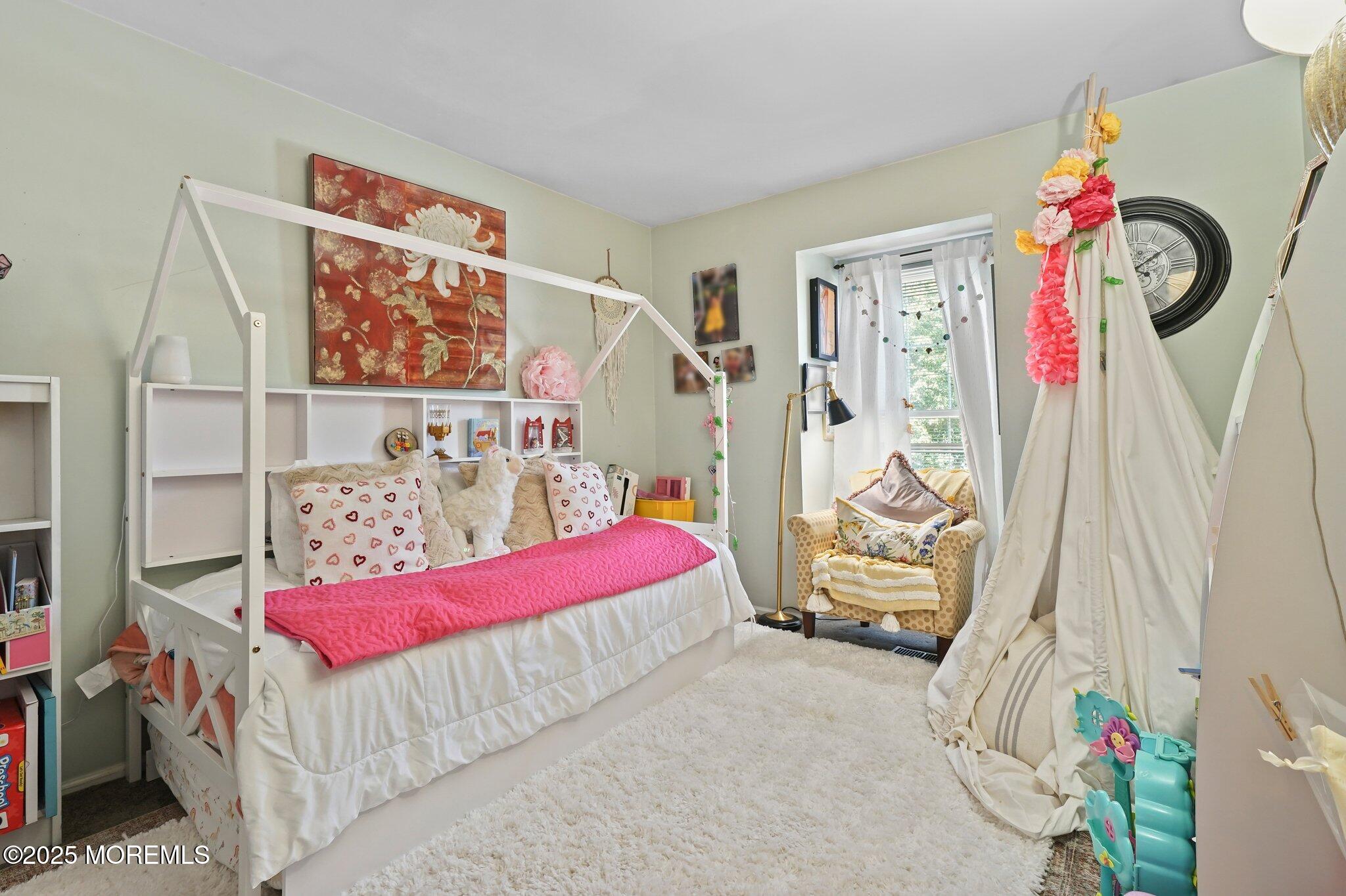 38 Sweet Gum Road Howell, NJ 07731 - Photo 11 of 23 a bedroom with a bed and a white cabinet