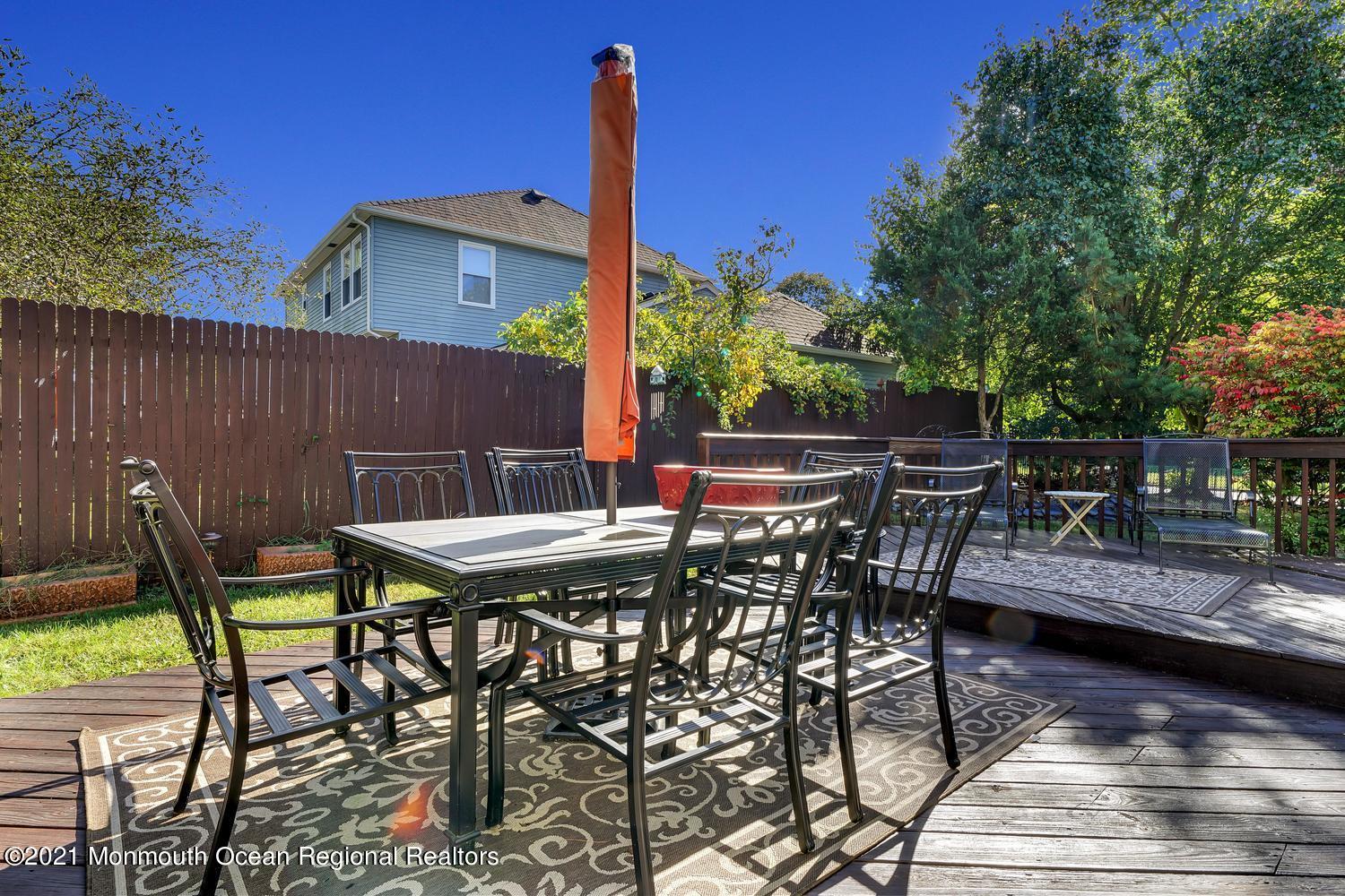 38 Sweet Gum Road Howell, NJ 07731 - Photo 17 of 23 a view of an outdoor sitting area with furniture