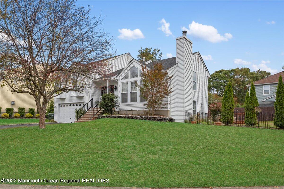 38 Sweet Gum Road Howell, NJ 07731 - Photo 3 of 23 a view of a house with a big yard and large trees