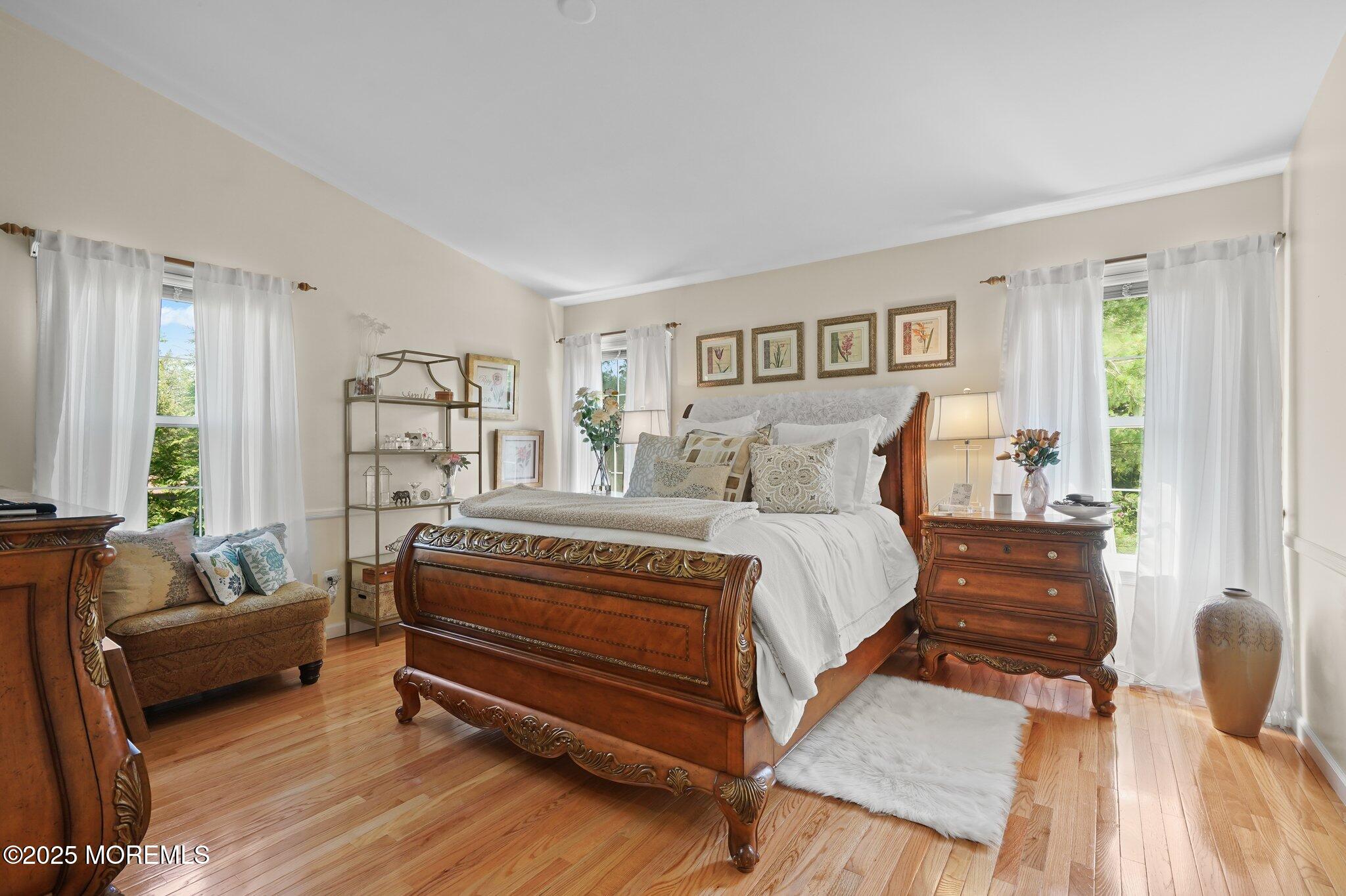 38 Sweet Gum Road Howell, NJ 07731 - Photo 6 of 23 a bedroom with a bed and a couch