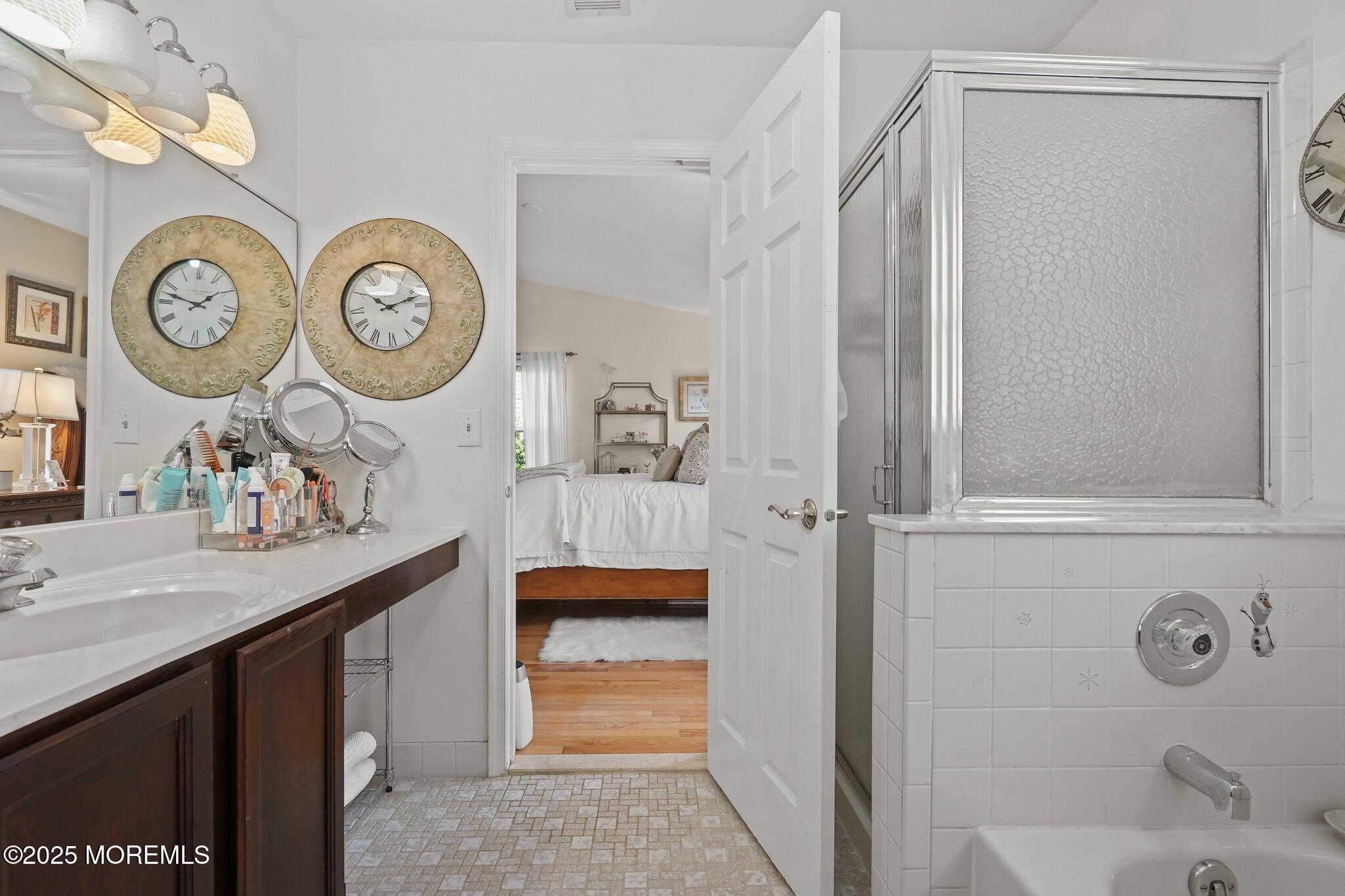 38 Sweet Gum Road Howell, NJ 07731 - Photo 9 of 23 a bathroom with a sink and a mirror