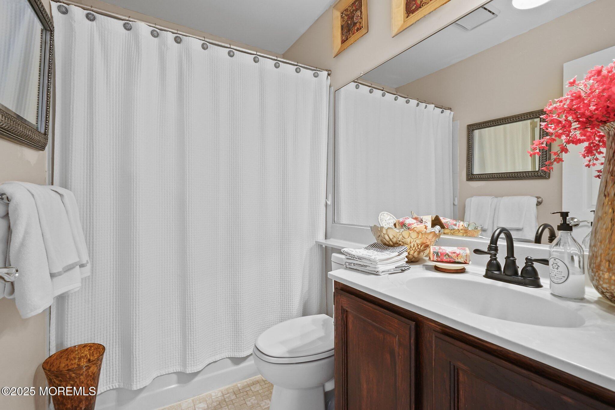 38 Sweet Gum Road Howell, NJ 07731 - Photo 10 of 23 a bathroom with a sink toilet and shower