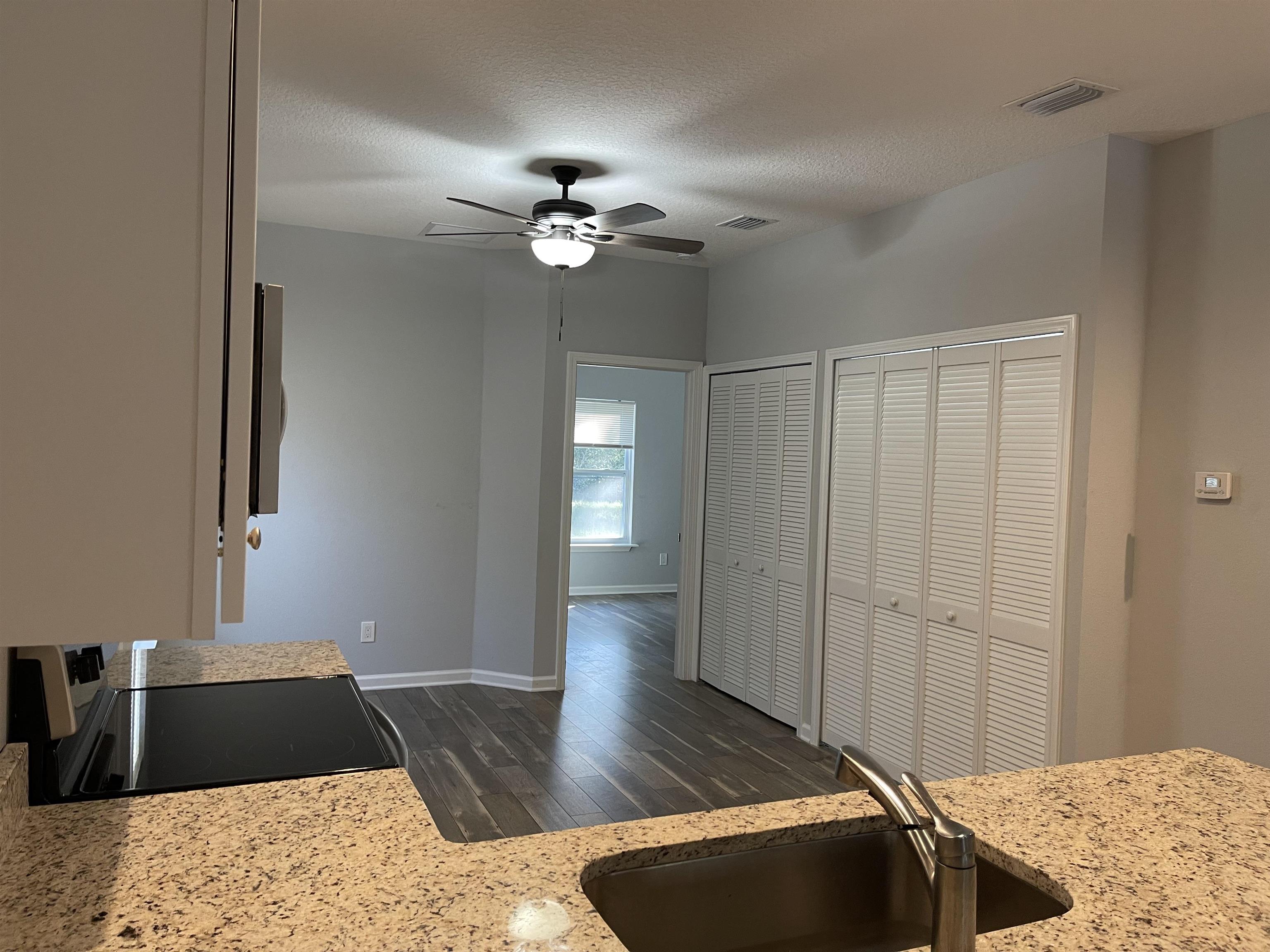 867 Helen Street St. Augustine, FL 32084 - Photo 4 of 11 a view of a livingroom with furniture and chandelier