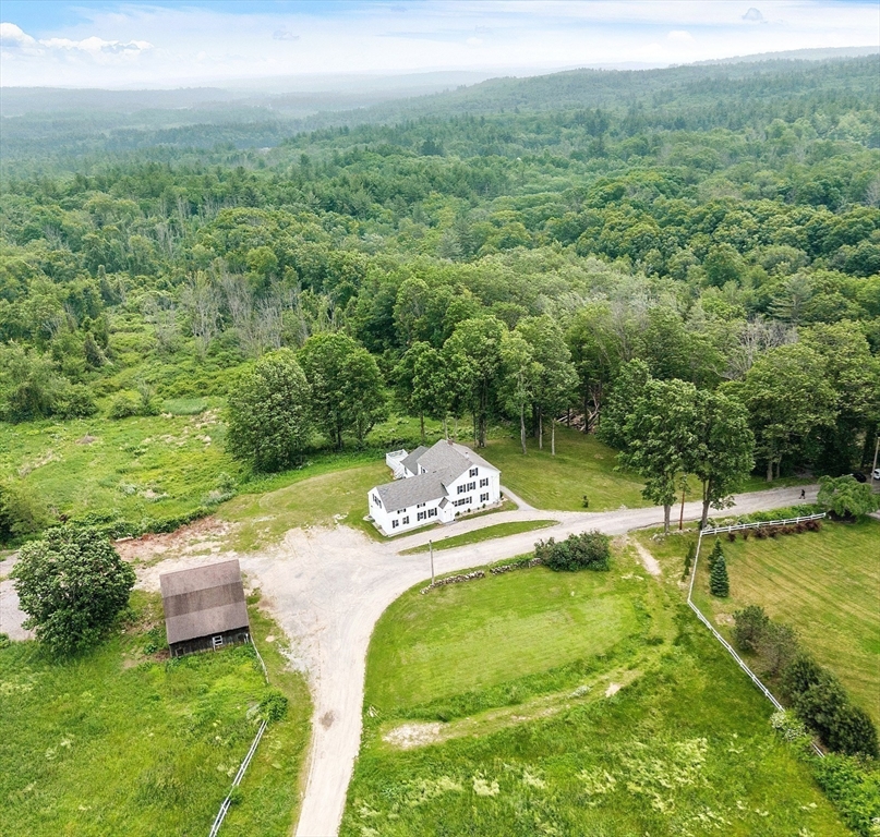 20 Town Farm Road Princeton, MA 01541 - Photo 8 of 42 a view of a swimming pool with a yard