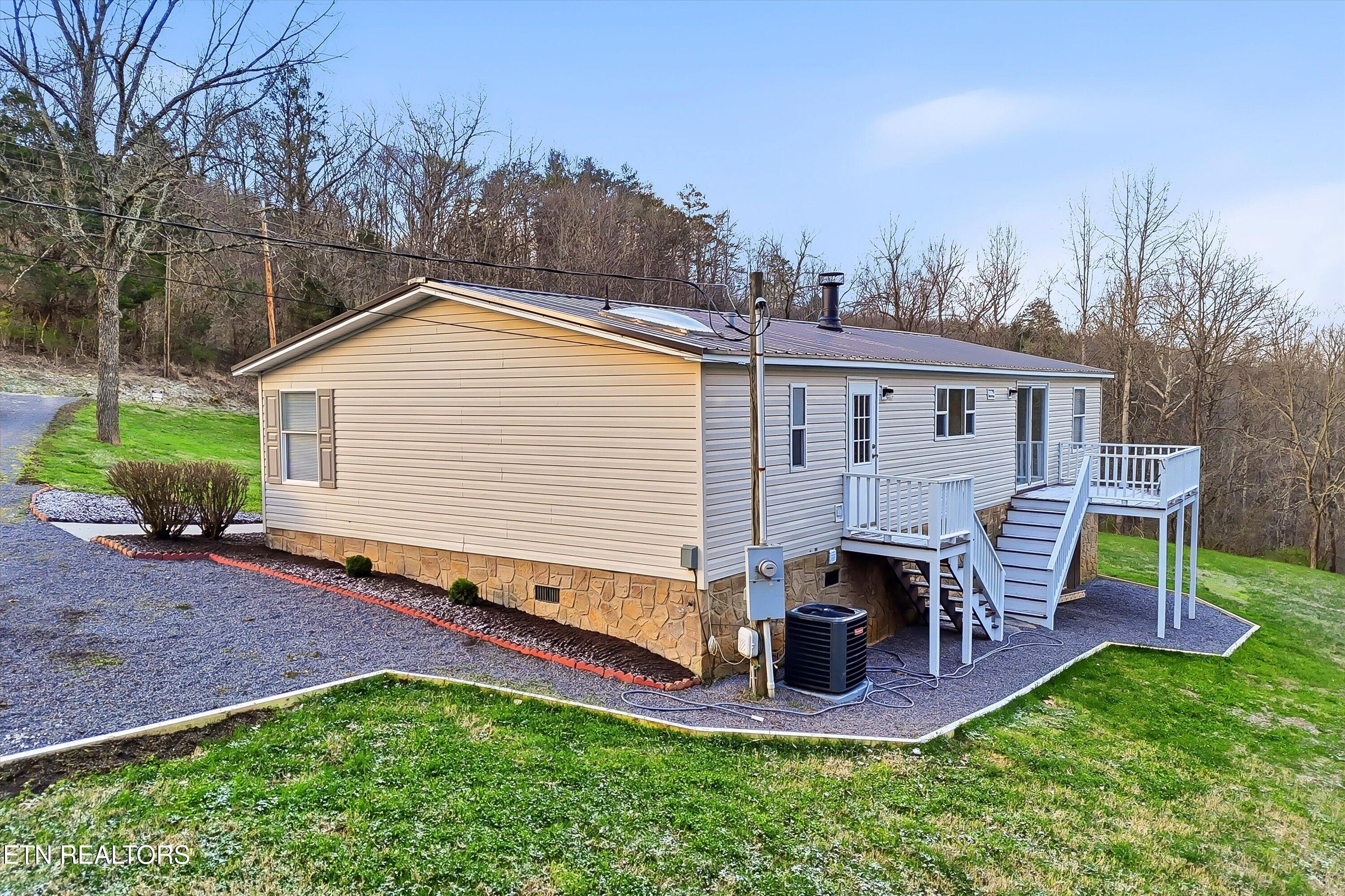2214 Hinds Creek Road Heiskell, TN 37754 - Photo 21 of 41 Deck plus Walkout from Laundry Room