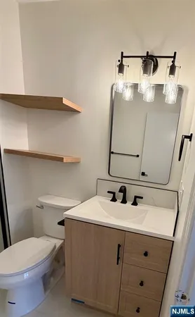 a bathroom with a sink and a toilet