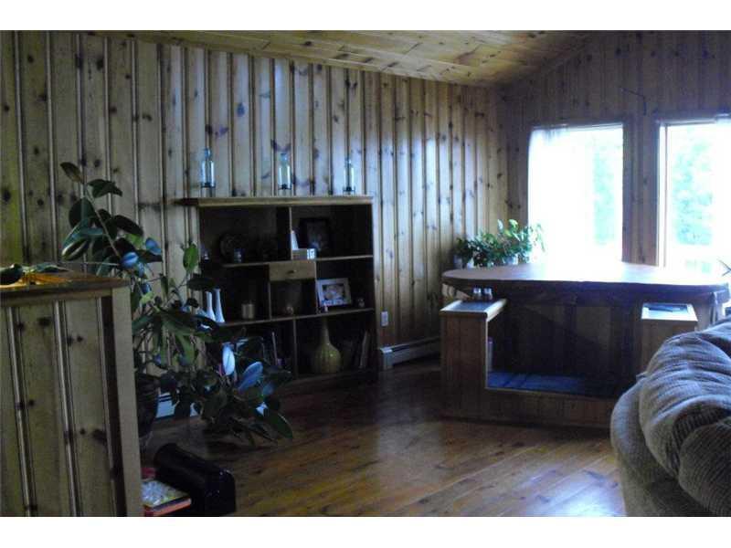 327 Eaton Hill Road Rumford, ME 04276 - Photo 25 of 25 Living Room. green room with hot tub