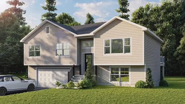 a view of a house with backyard