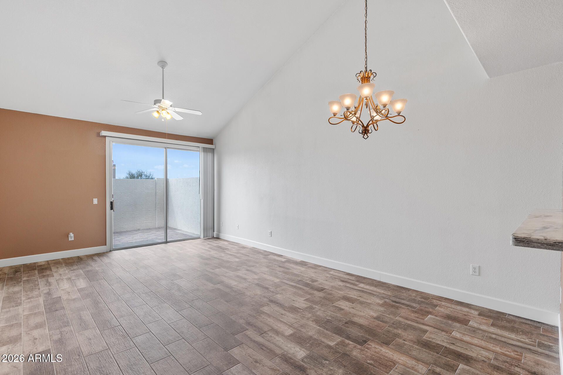 7101 West Beardsley Road, Unit 1303 Glendale, AZ 85308 - Photo 18 of 53 a view of a chandelier in a room