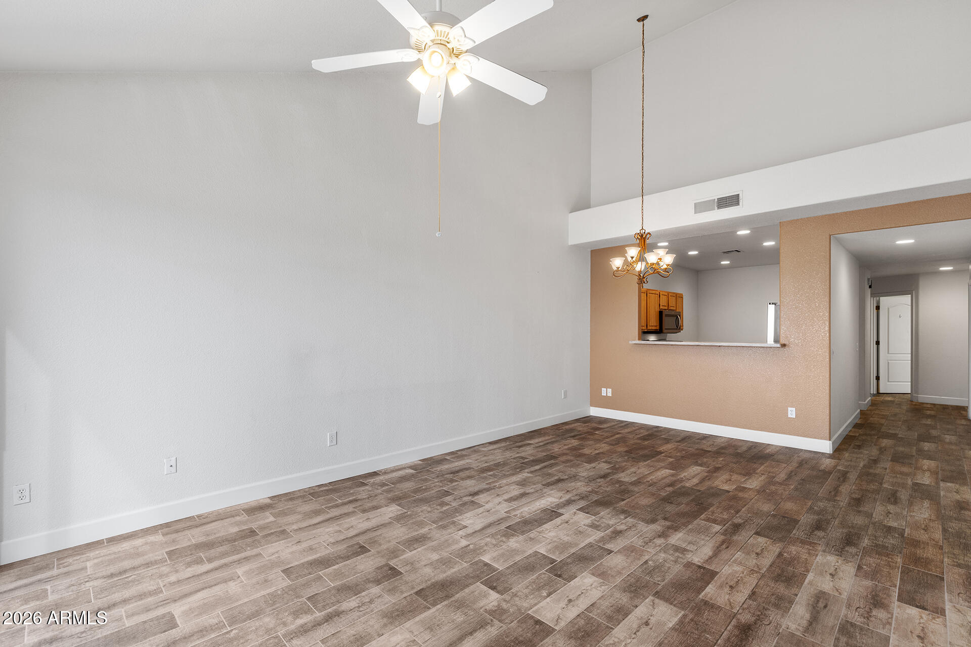 7101 West Beardsley Road, Unit 1303 Glendale, AZ 85308 - Photo 22 of 53 an empty room with fan and fan