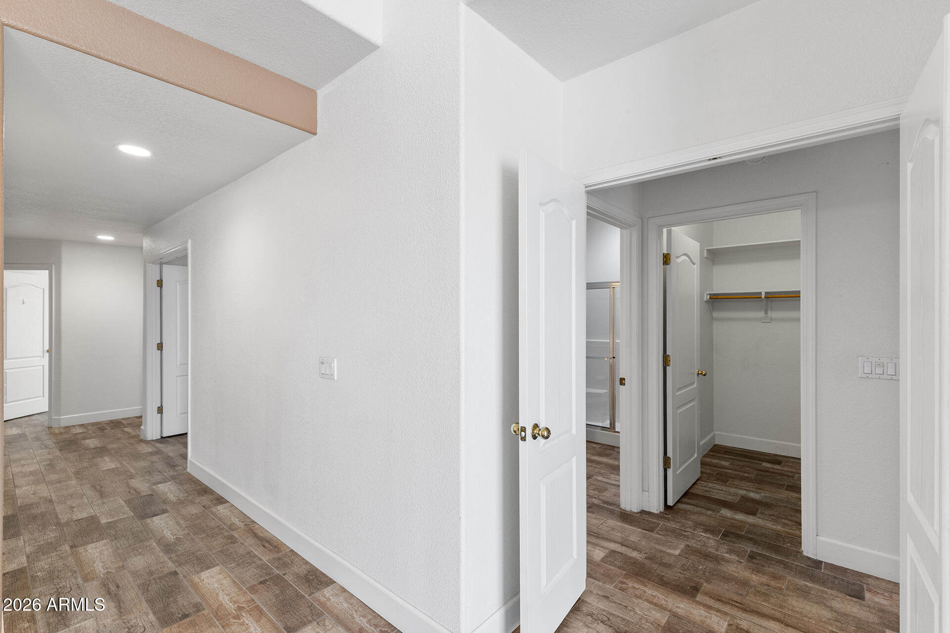 7101 West Beardsley Road, Unit 1303 Glendale, AZ 85308 - Photo 24 of 53 a view of hallway with wooden floor