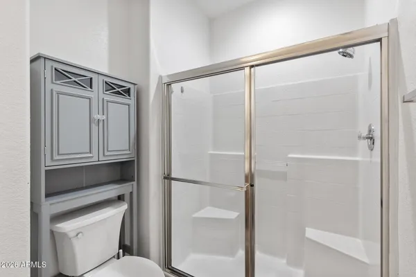 a view of a hallway with closet area