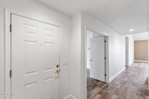 a view of an empty room with a window
