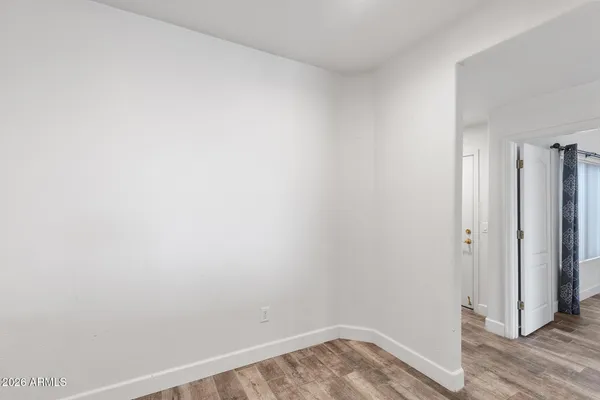 a view of entryway with wooden floor