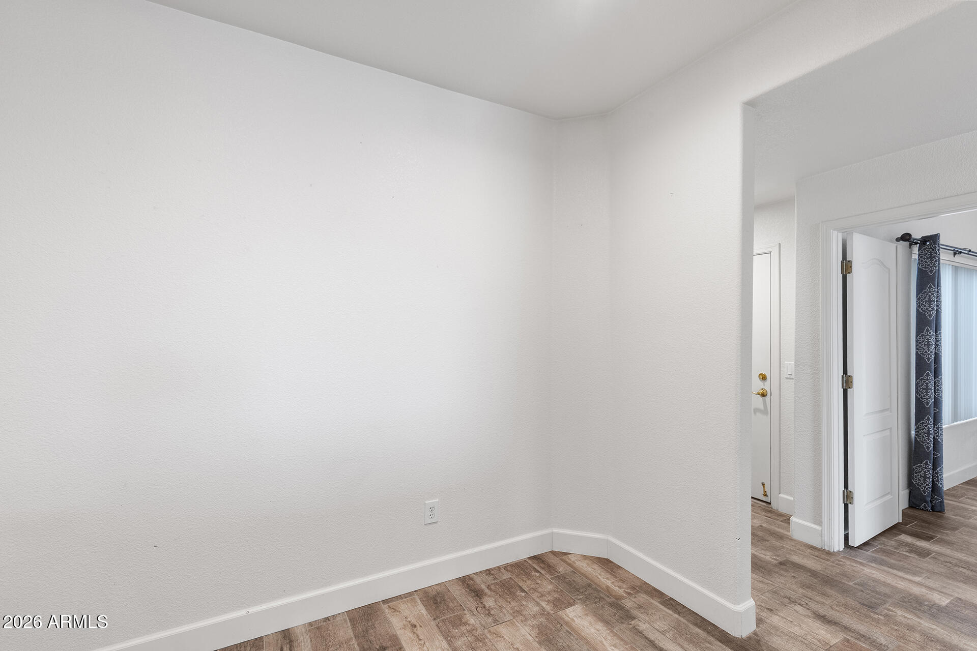 7101 West Beardsley Road, Unit 1303 Glendale, AZ 85308 - Photo 35 of 53 a view of small space with wooden floor