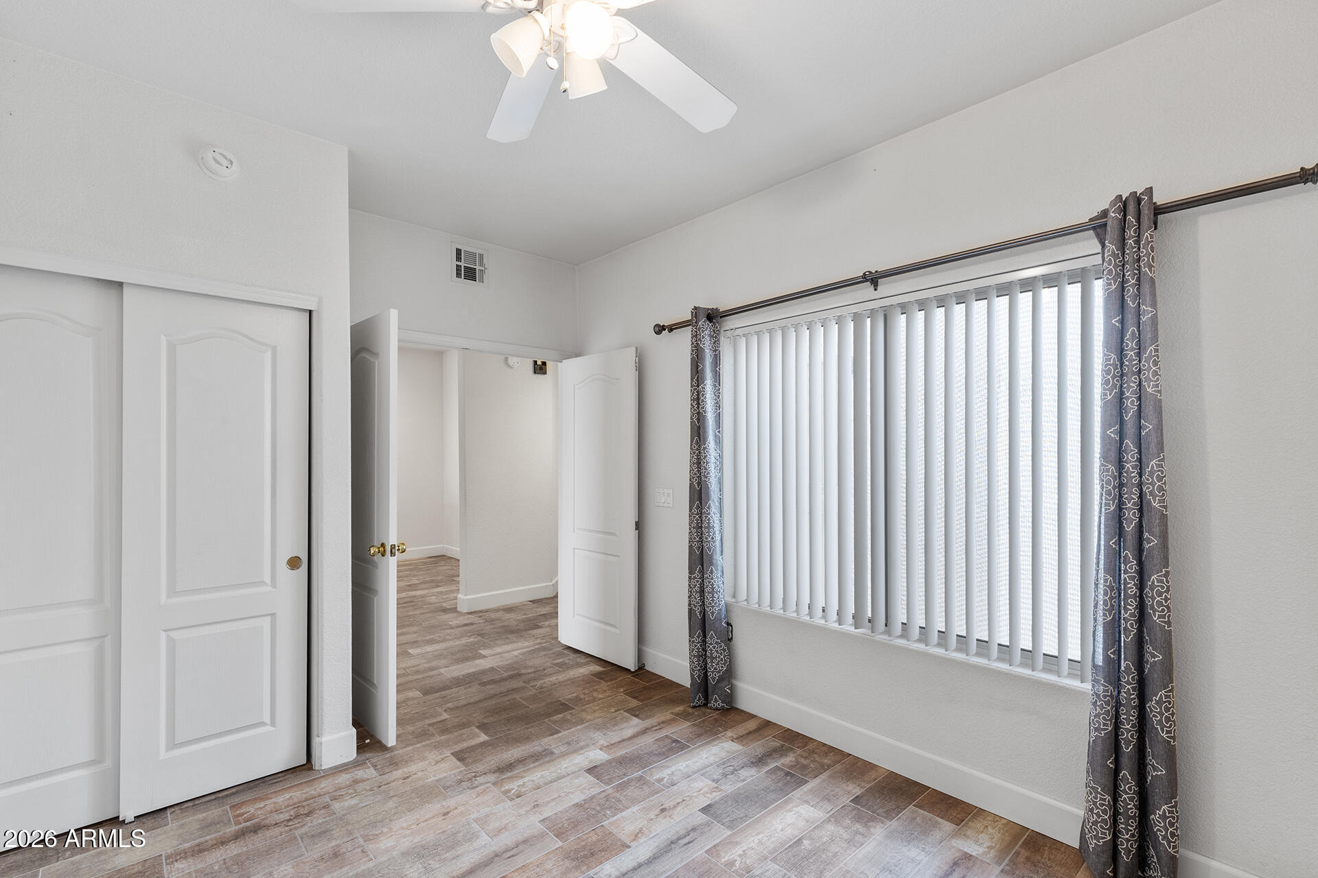 7101 West Beardsley Road, Unit 1303 Glendale, AZ 85308 - Photo 37 of 53 a view of entryway with wooden floor