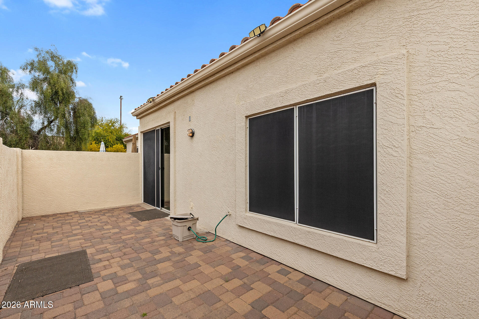 7101 West Beardsley Road, Unit 1303 Glendale, AZ 85308 - Photo 46 of 53 a view of backyard with potted plants