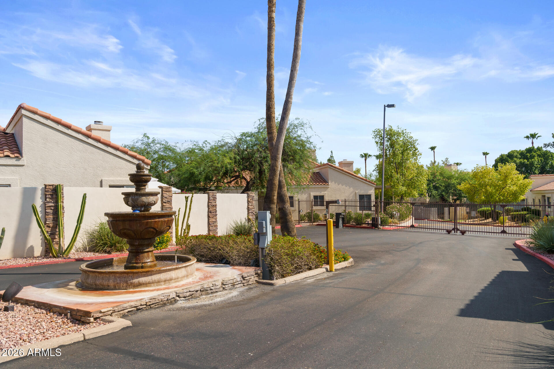 7101 West Beardsley Road, Unit 1303 Glendale, AZ 85308 - Photo 53 of 53 a view of a patio with a table and chairs