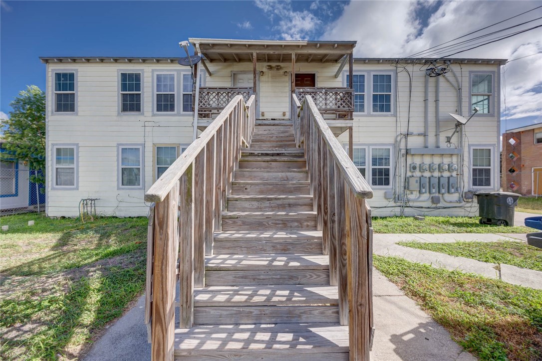 2437 Nemec Street Corpus Christi, TX 78415 - Photo 27 of 38 a view of a house with a small yard and wooden floor and fence