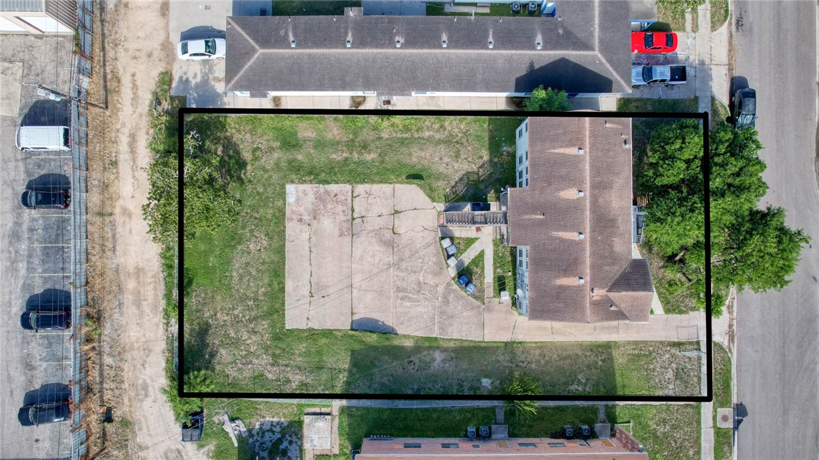 2437 Nemec Street Corpus Christi, TX 78415 - Photo 34 of 38 an aerial view of a house with a yard and a fountain