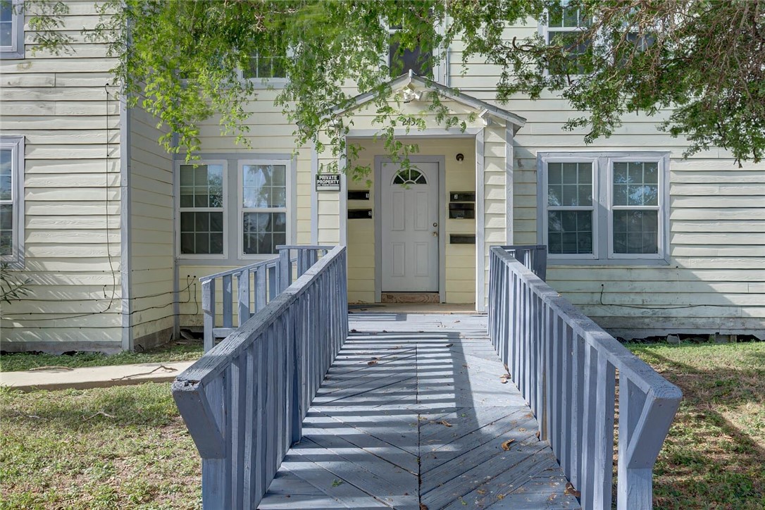 2437 Nemec Street Corpus Christi, TX 78415 - Photo 6 of 38 a view of a house with wooden deck front of house