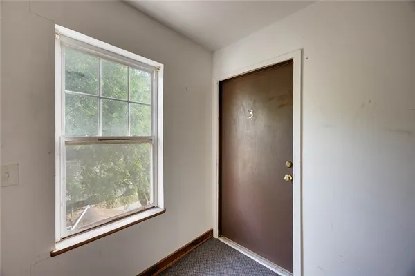 an empty room with window