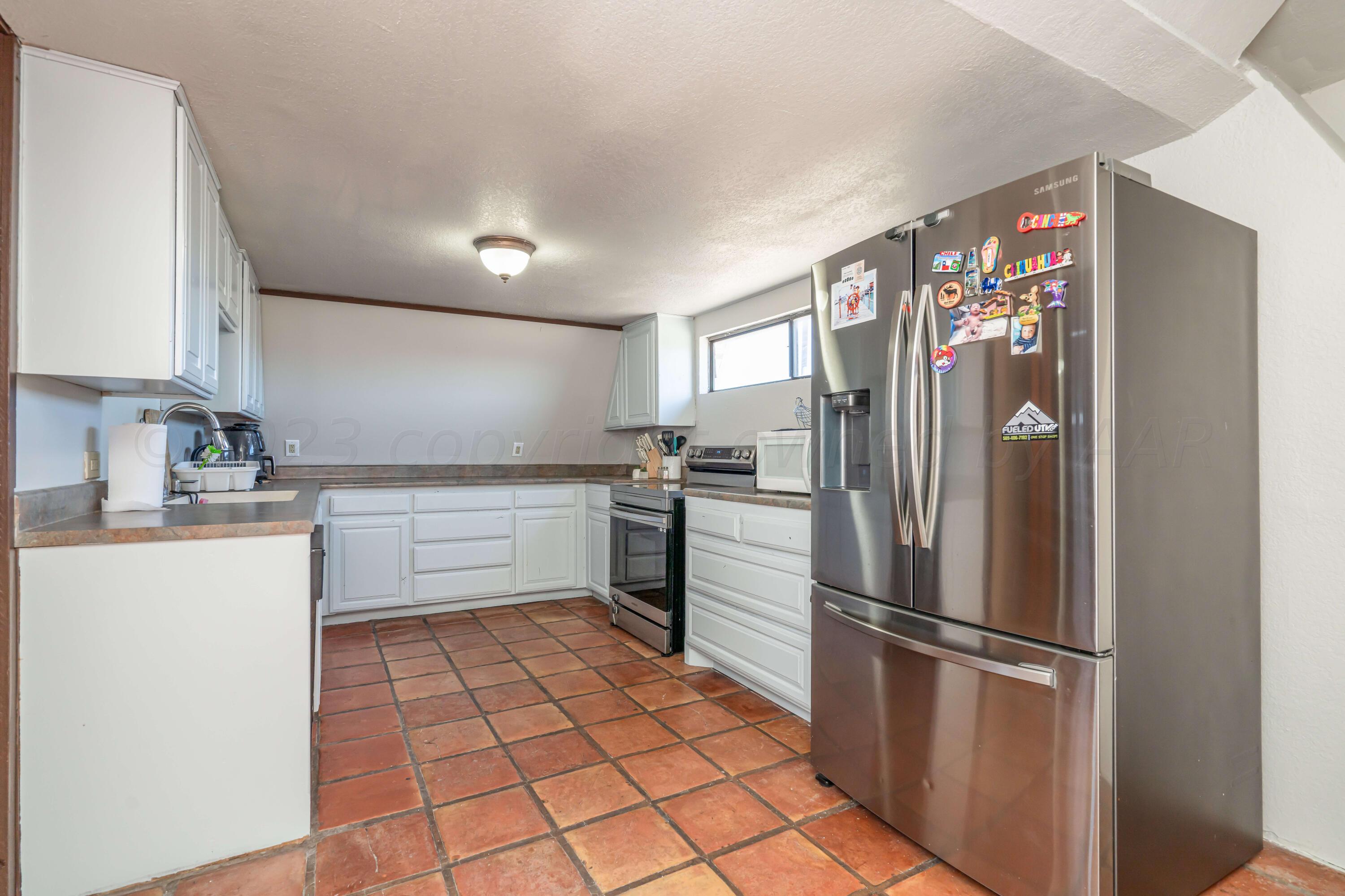 676 Cherokee Road Fritch, TX 79036 - Photo 18 of 62 676 Cherokee_-15 KITCHEN