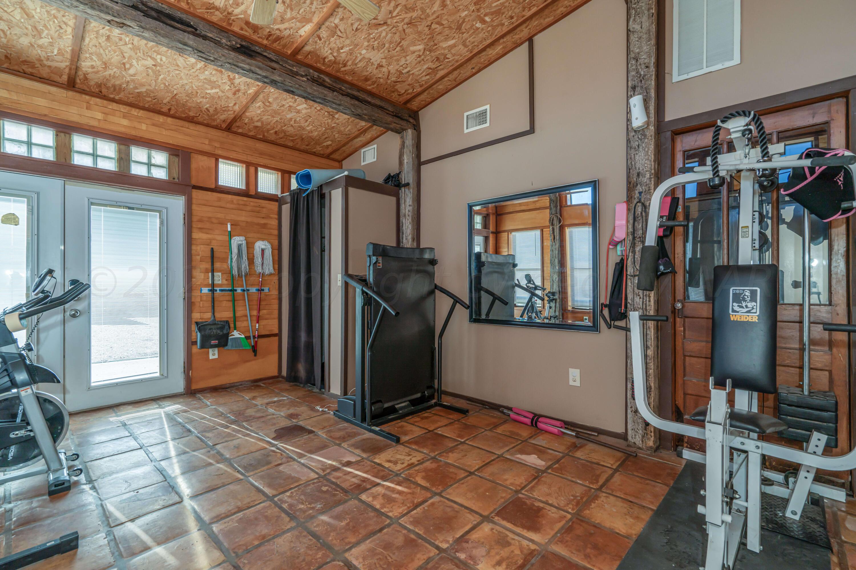 676 Cherokee Road Fritch, TX 79036 - Photo 28 of 62 676 Cherokee_-25 SUNROOM