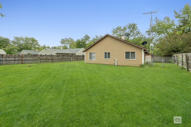 76 Fernwood Road Montgomery, IL 60538 - Photo 13 of 13 a view of a house with a yard