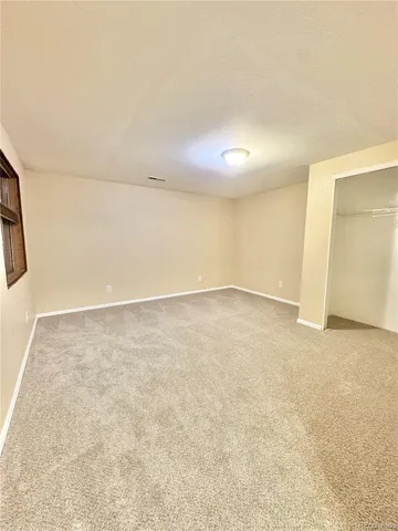 an empty room with a natural light