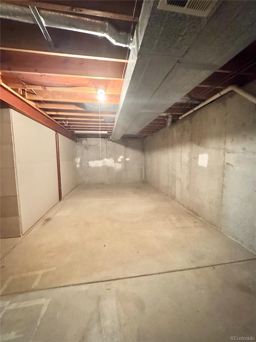 17938 East Amherst Avenue Aurora, CO 80013 - Photo 16 of 16 a view of parking garage