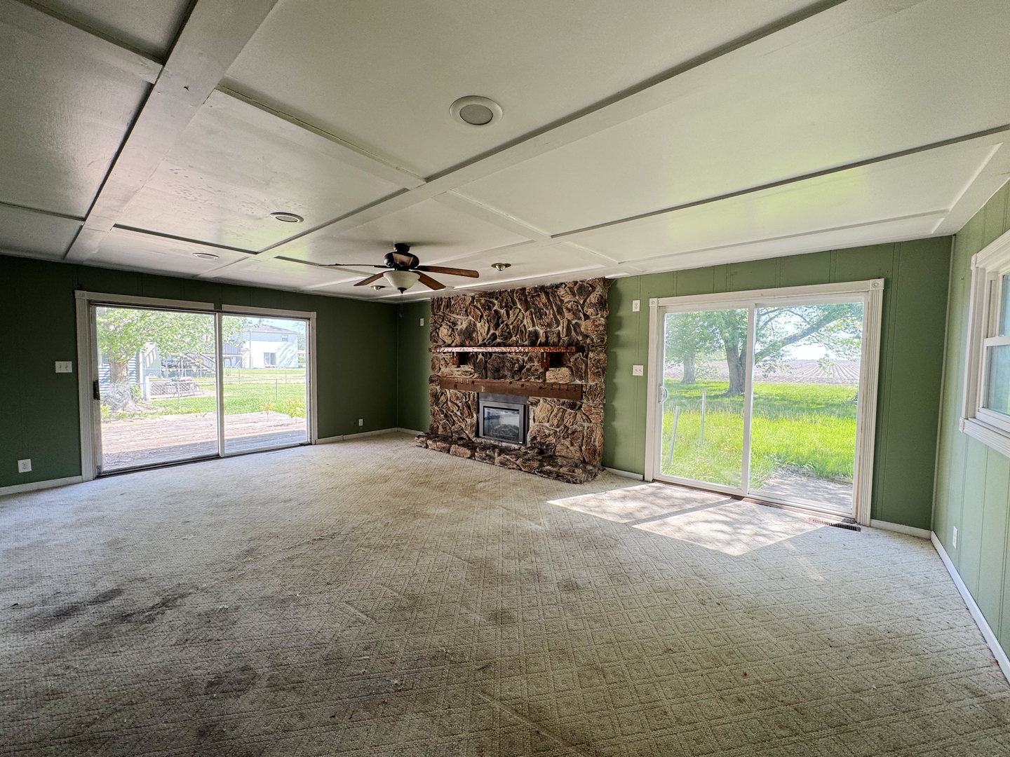 310 North 3rd Avenue Chenoa, IL 61726 - Photo 12 of 23 a view of a room with furniture and a large window