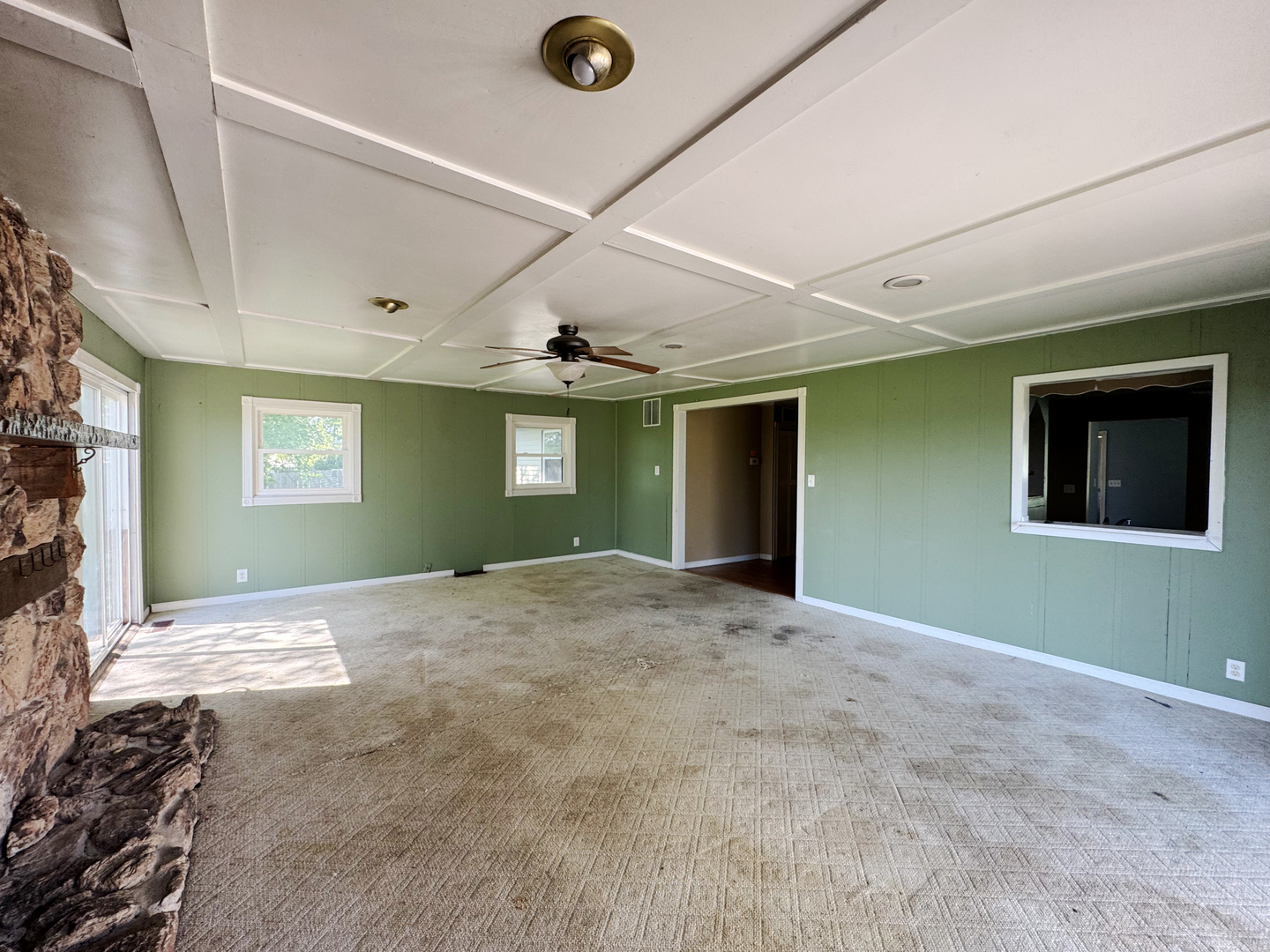 310 North 3rd Avenue Chenoa, IL 61726 - Photo 14 of 23 a view of a livingroom with an empty space and a window