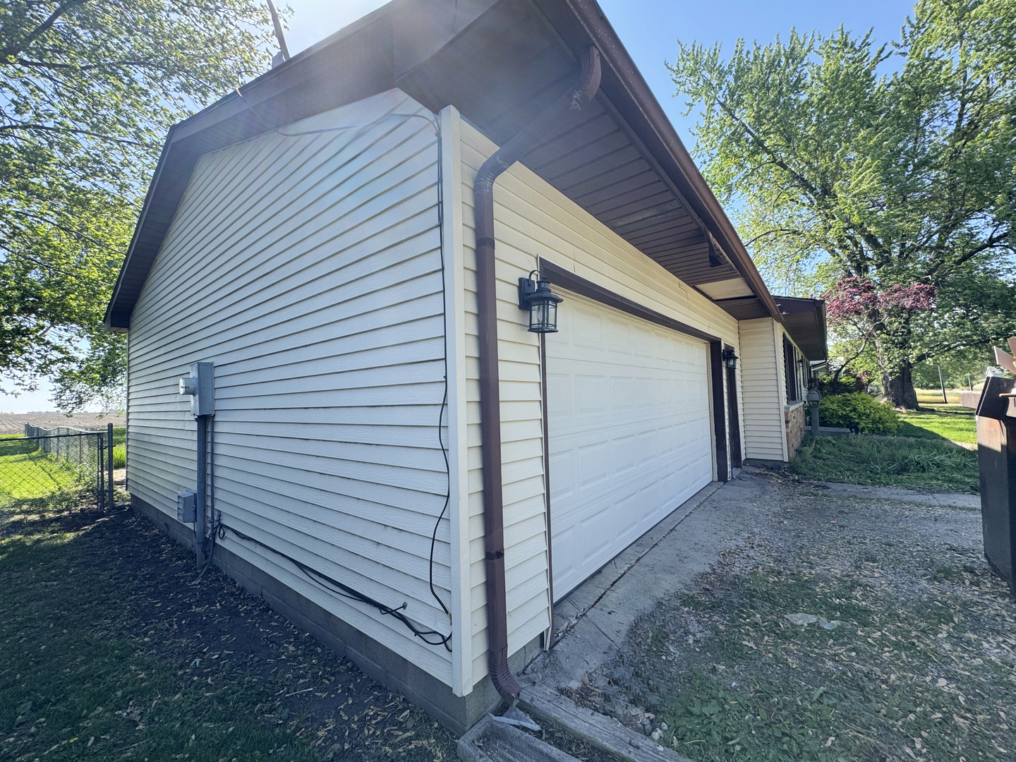 310 North 3rd Avenue Chenoa, IL 61726 - Photo 2 of 23 a view of backyard of house and trees