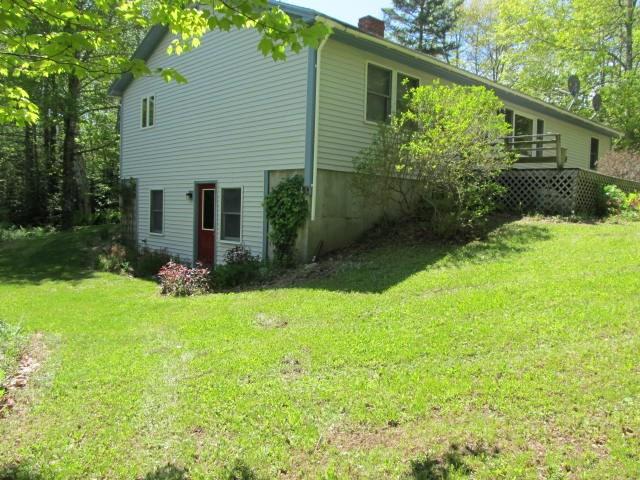 344 Harriman Point Road Brooklin, ME 04616 - Photo 2 of 14 Side of house with "walk out" basement