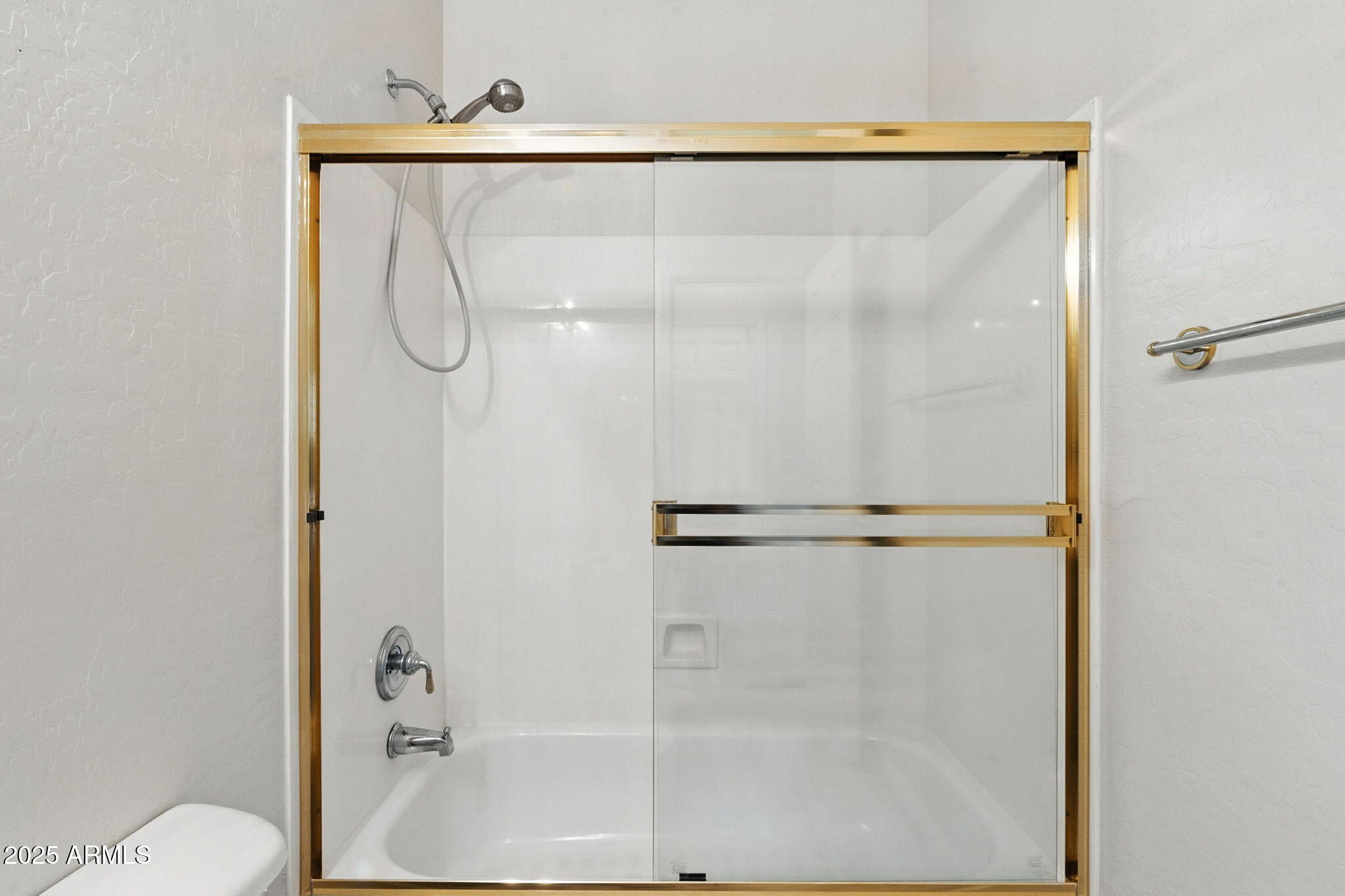 16420 North Thompson Peak Parkway, Unit 2031 Scottsdale, AZ 85260 - Photo 15 of 30 a bathroom with a shower and a toilet