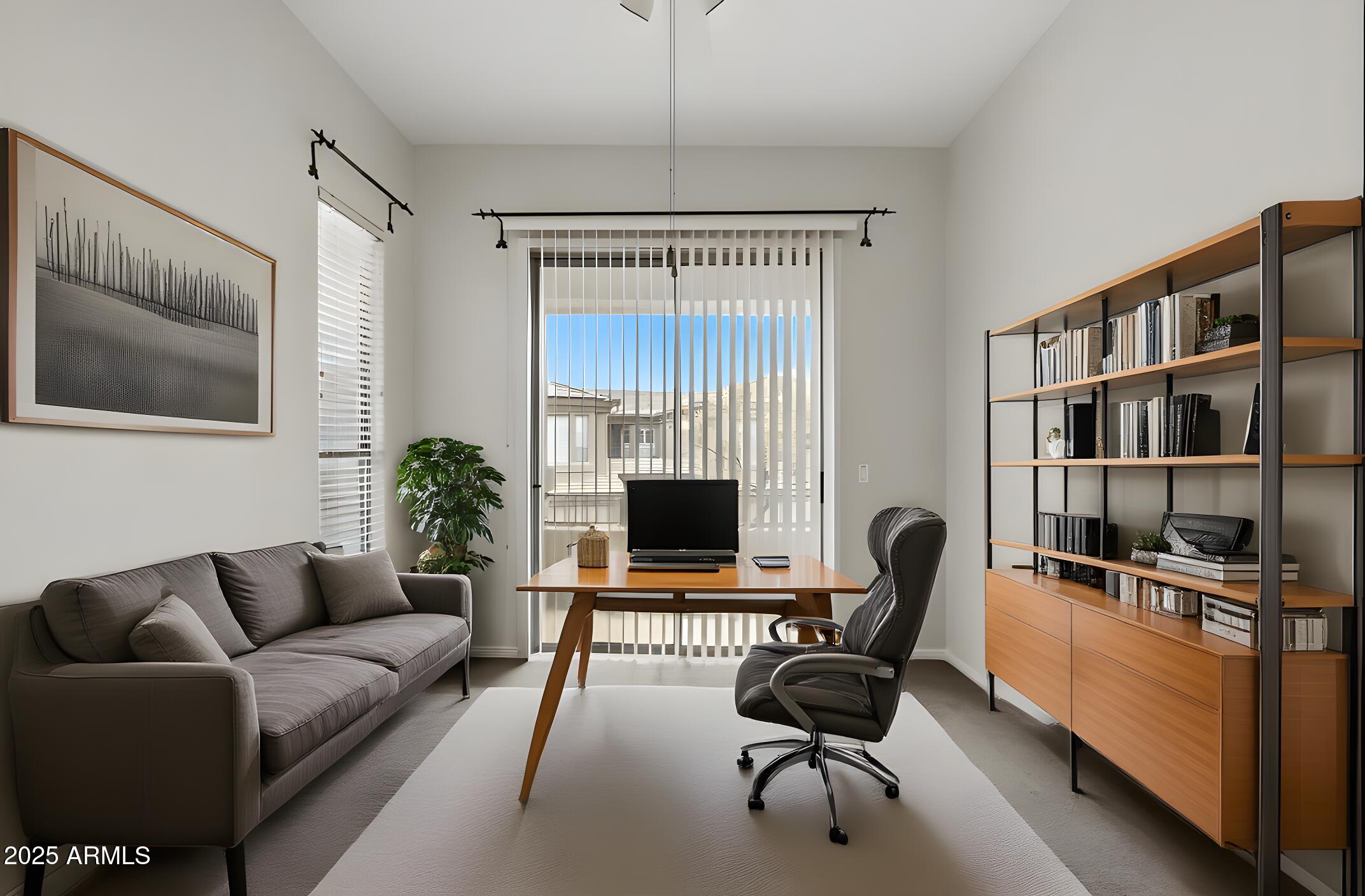 16420 North Thompson Peak Parkway, Unit 2031 Scottsdale, AZ 85260 - Photo 17 of 30 a living room with furniture and a flat screen tv